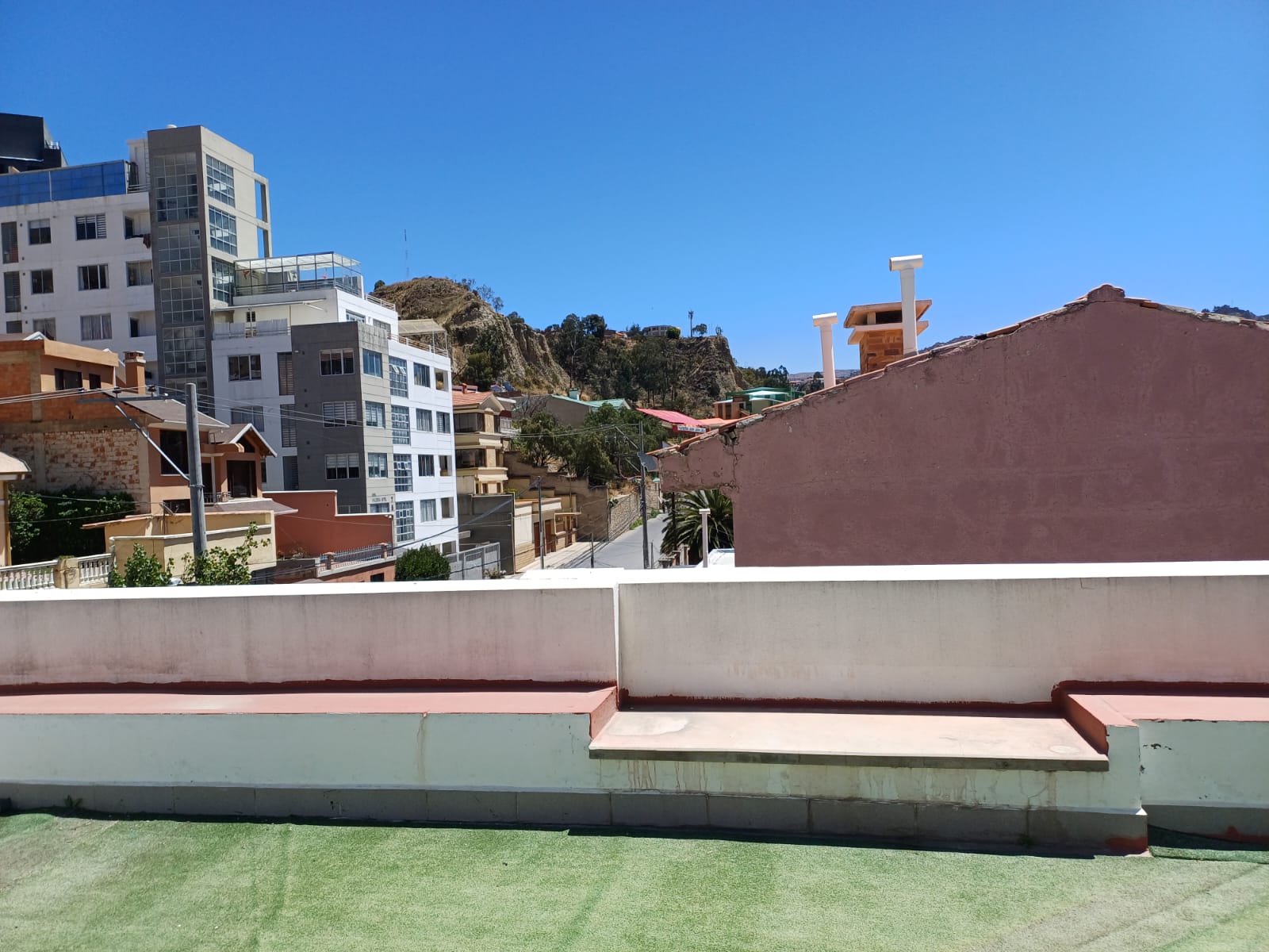 Terraza y parrillero